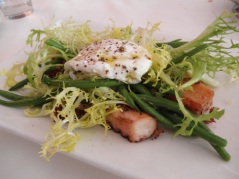 Octopus salad with a poached egg